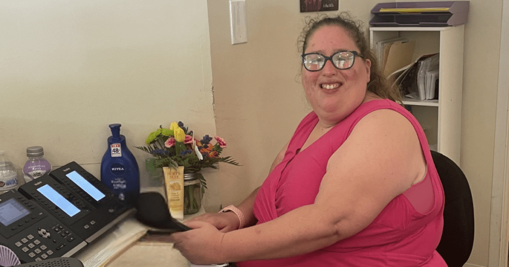 Clerical worker sitting at desk