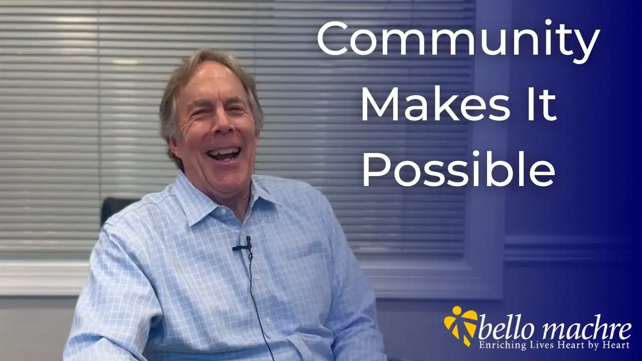 Board Chair, Griff Hall, smiling with text reading "Community Makes It Possible"
