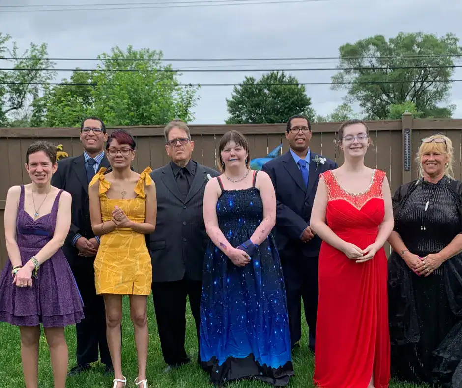 Group of Bello Machre individuals dressed for a formal dance.