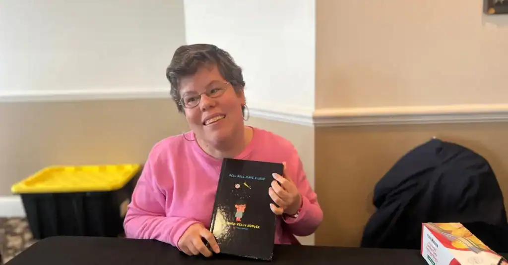 Kelly selling her debut children’s book titled “Kell Bell Made A Wish”