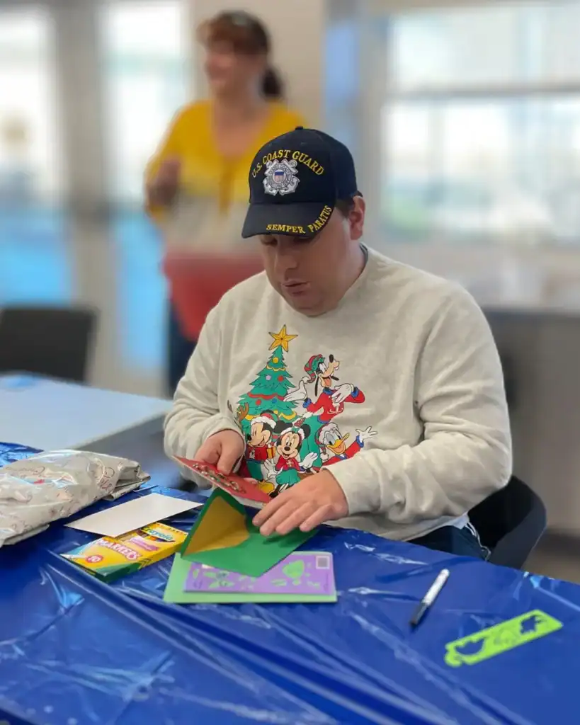 CDS recipient creating and sealing beautiful cards!