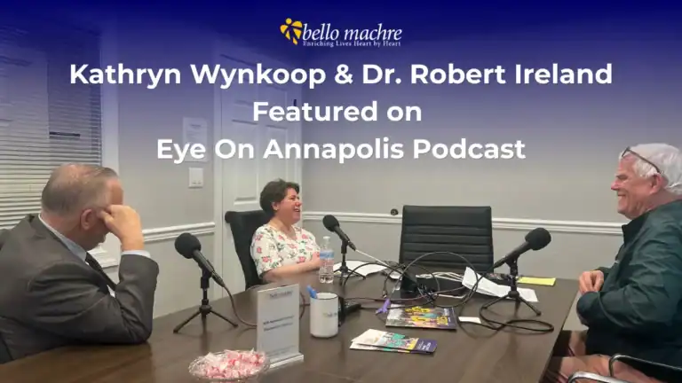 Image of Dr. Ireland, Kathryn, and John Frenaye with text overtop reading "Kathryn Wynkoop & Dr. Robert Ireland Featured on Eye on Annapolis Podcast."